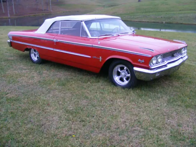 beautiful restored example of a 60's big block convertible cruiser with flash!