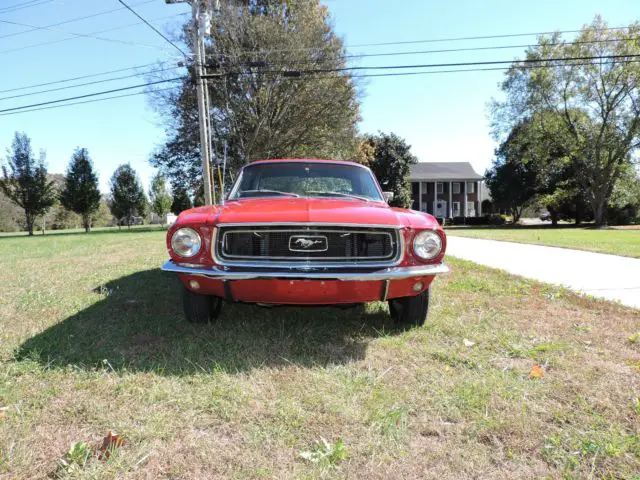 1968 red ford mustang coupe