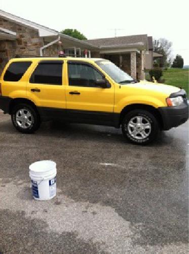 2003 yellow ford escape in spring grove, pa