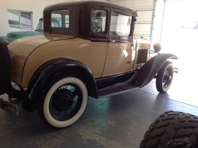 1930 ford model a, coupe all stock ,restored & been in storage for past 25 years
