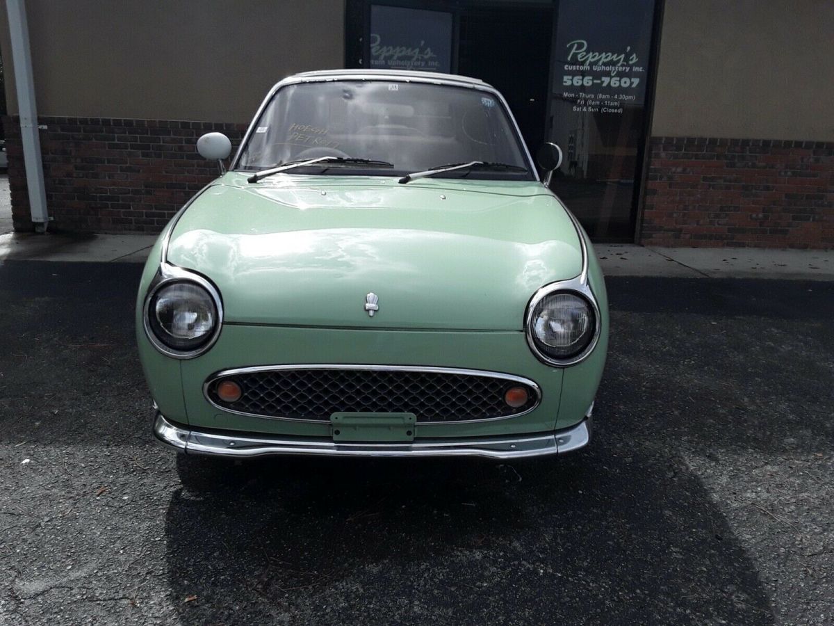 rust free,1991 nissan figaro convertible,low miles,florida title, restored int