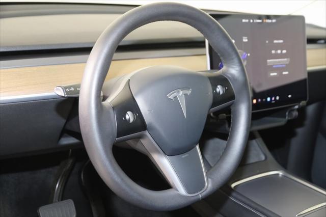 2021 tesla model y standard range rear-wheel drive