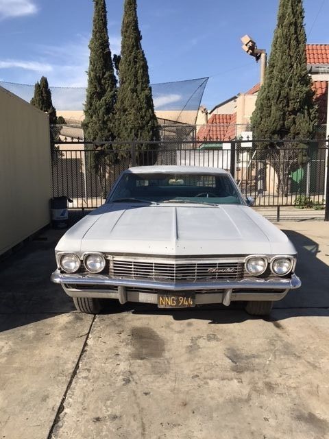 1965 chevrolet imapala 4 door hard top (no post)