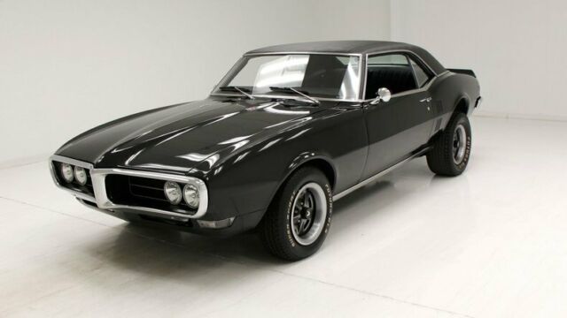 miles deep metallic black/rebuilt 350ci v8 5-speed/showroom interior