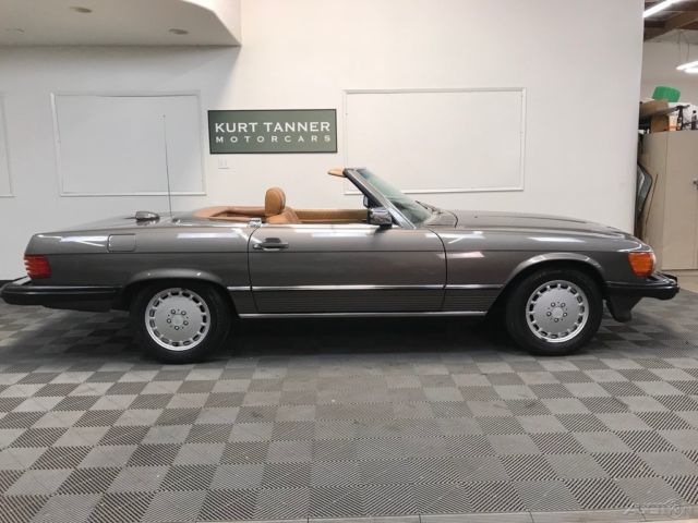 1986 mercedes benz 560sl. anthracite with palomino. drives well. 80,228 miles