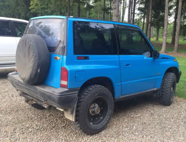 1994 geo tracker 4x4, blue, rare tin top, 5 speed manual