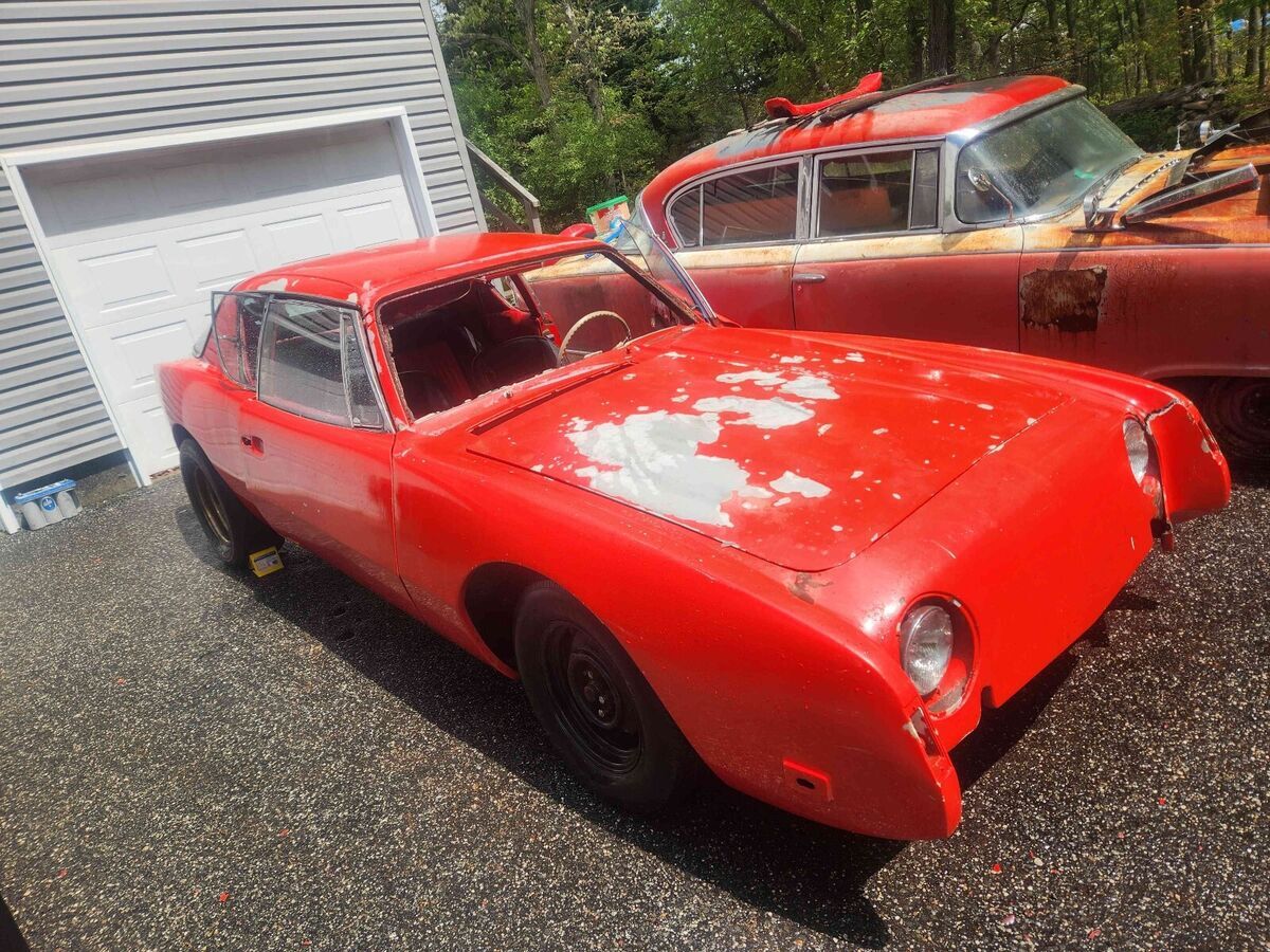 1963 studebaker avanti coupe red