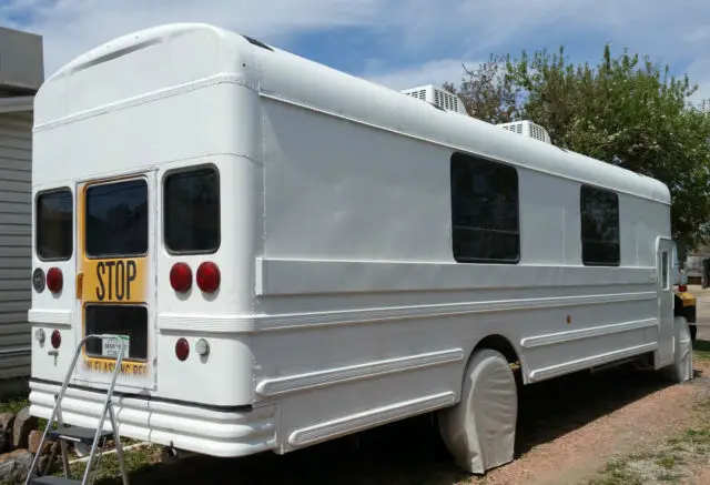 skoolie,school bus,tiny home,16 inch roof raise,dual roof air/heat pumps,gas,air
