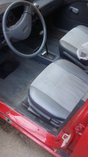1990 geo metro base hatchback 4-door 1.0l