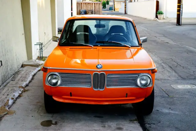 1973 bmw 2002 inka orange roundie