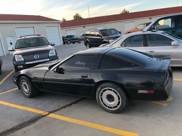 1984 chevrolet corvette c4. black. manual trans. ****salvage title****
