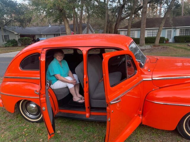 1947 ford super deluxe sedan orange rwd manual