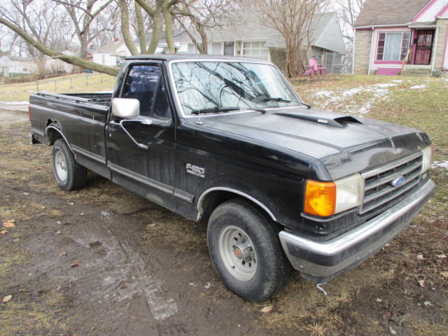 ford: f-150 black 2-door grey interior. over 200.000 miles