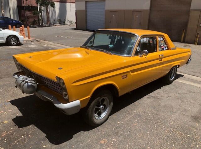 1965 mercury comet sedan yellow rwd manual