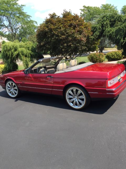 excellent condition pearl red 3sets of wheels inc.18"vogues fresh paint