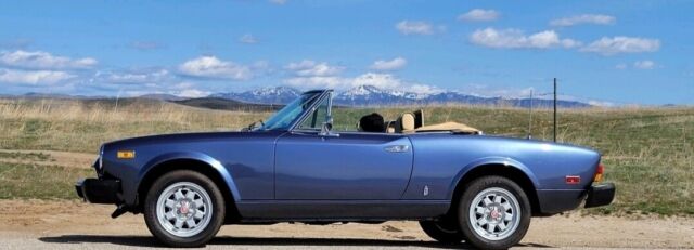 1982 a beauty. fiat 124 convertible blue, manual, fuel injection