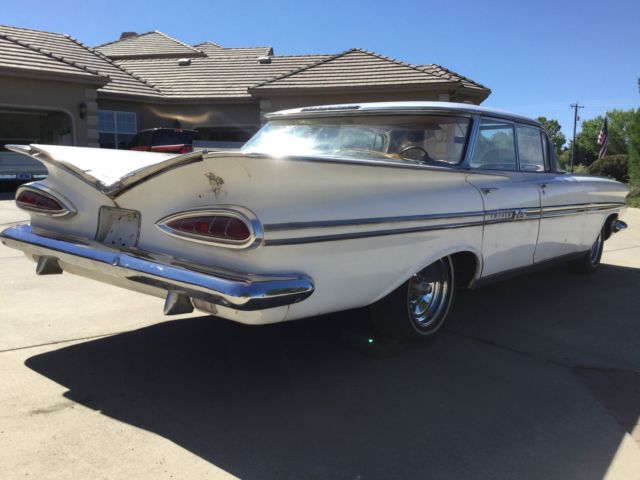original 1959 chevrolet impala 4 door sedan with original 283 engine, nice!