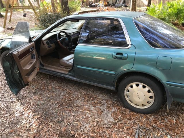1994 and 1993 acura vigors, 4 dr sedans, 5cyl, at, ac, for parts / repair