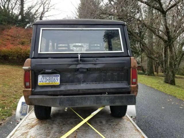 1973 ford bronco uncut, rusty, aaa service gas station lot truck