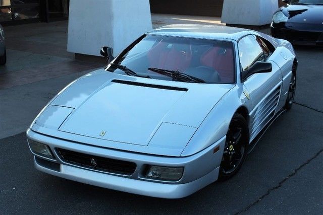 1990 ferrari 348 ts. silver/red. 5-speed manual. sport seats. clean car fax