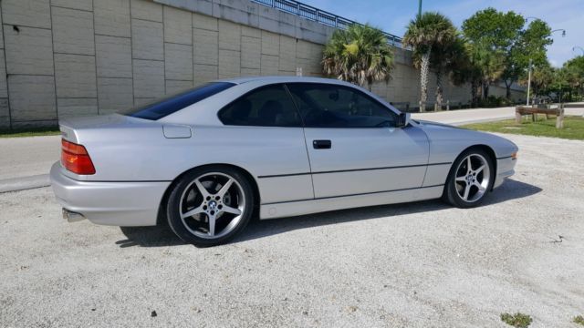 v-12,heart stopping good looks,perfect stance,low miles,sweet 12 cylinder sound