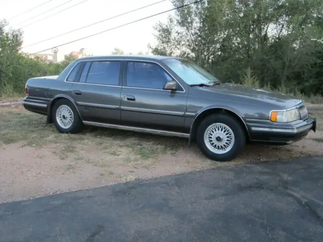 low mileage, low price classic luxury car