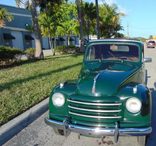 1954 fiat 500 c topolino convertible. dark green with brown interior. superb car