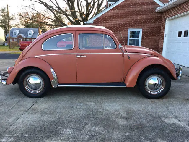 1960 coral red euro vw rag top beetle