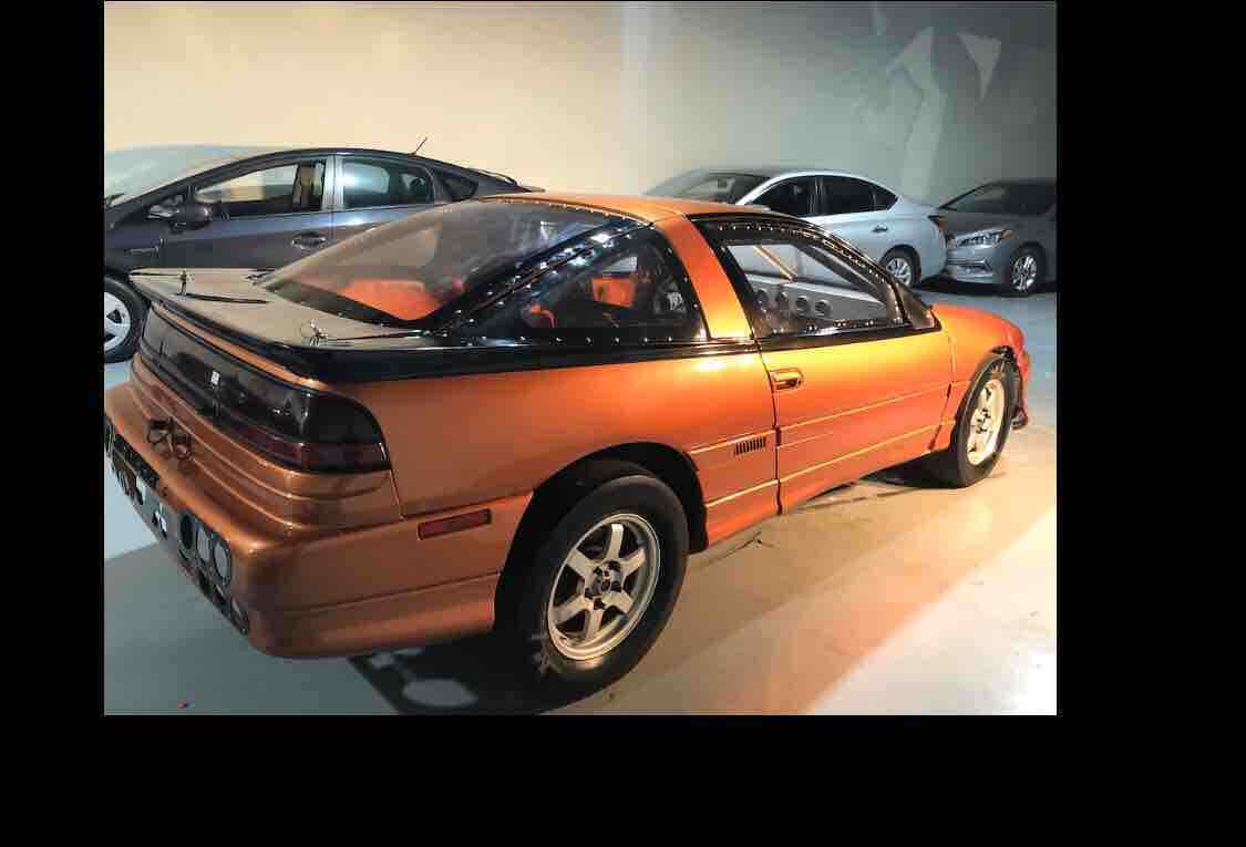1990 eagle talon hatchback orange tsi