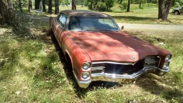 1966 cadillac coupe deville red