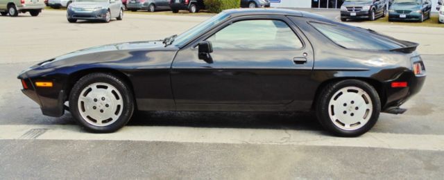 928s4 ---- 58,000 actual miles ----- black on red interior