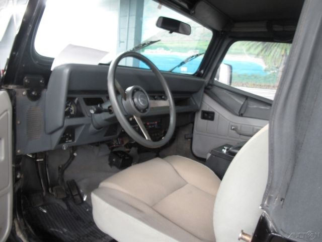 please scroll down and view all pictures and carfax report
