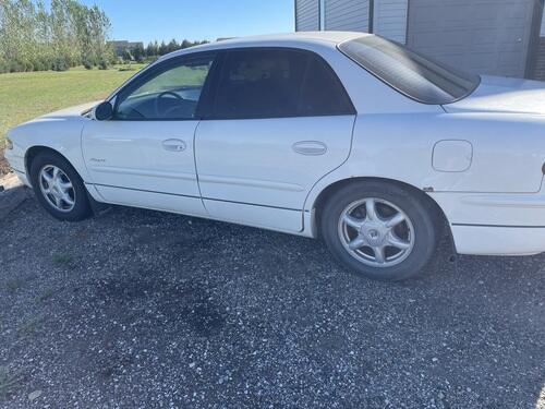 2001 buick regal it has dark leather runs and drives good, front tires only have