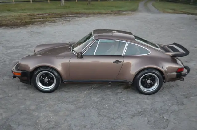 34 year owner on a 37854 mile two owner 930 turbo in copper brown metallic coa