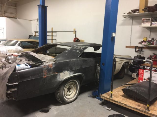 2 1966 chevy impalas. one running with some rust the other a rust free donor
