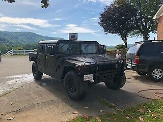 custom hummer h1... former military. rebuilt in 2004!! seriously bada$$!