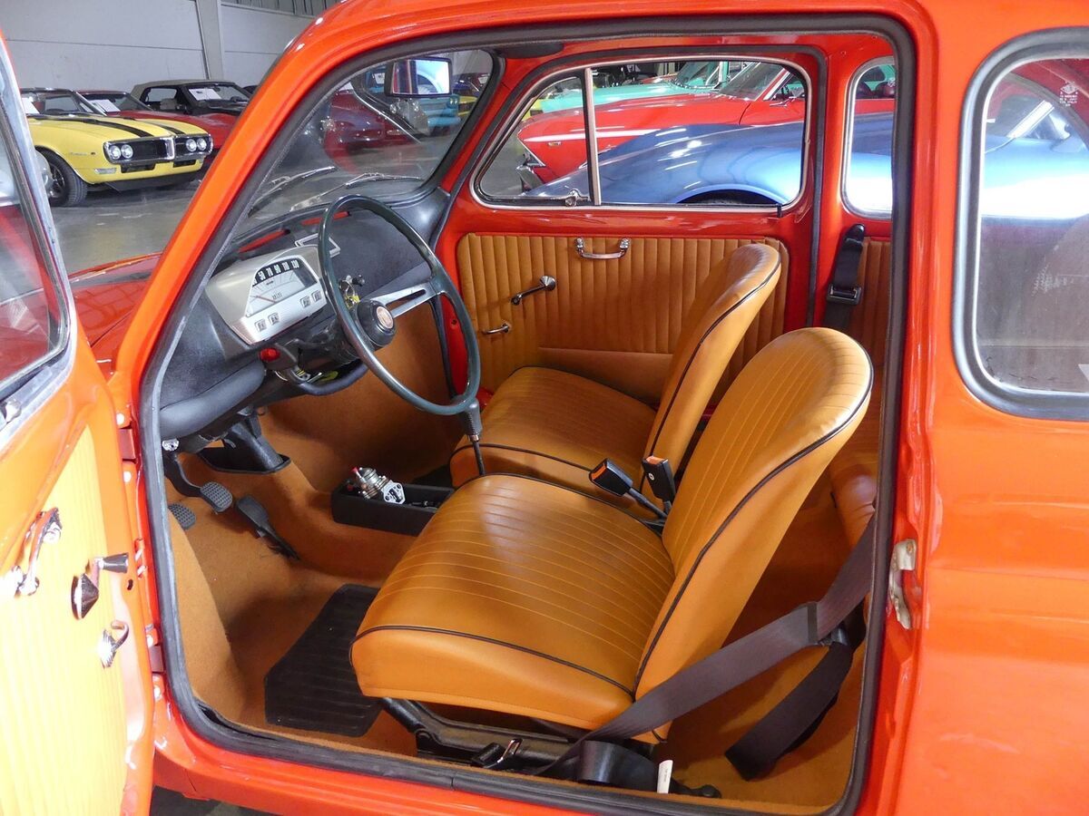 super clean and fun! great color combination. canvas roof, beige vinyl buckets