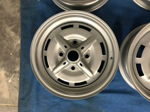 1974-1976 porsche 914 or vw super beetle steel rims powder coated bright silver