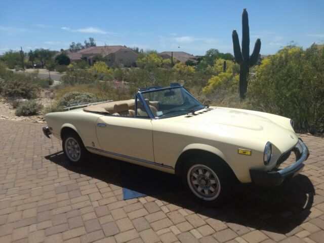 1982 fiat spider, 72k miles, classic yellow, looks great, drives good, some rust