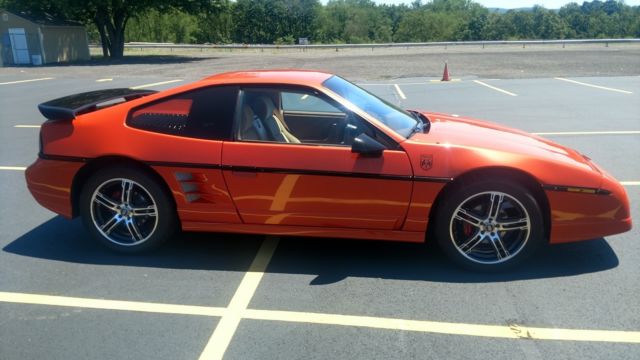 88 pontiac fiero gt 34,000 miles 5 spd. sebring pearl orange