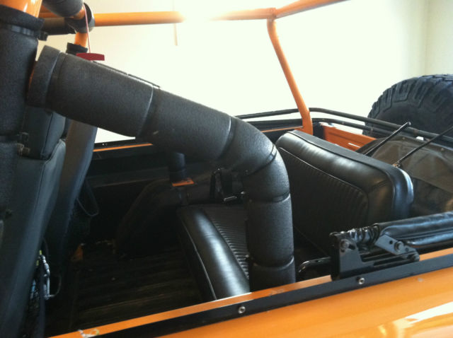 1970 early bronco, orange, excellent condition, frame off restoration