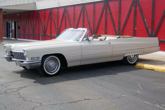 cream cadillac deville with 16,700 miles available now!