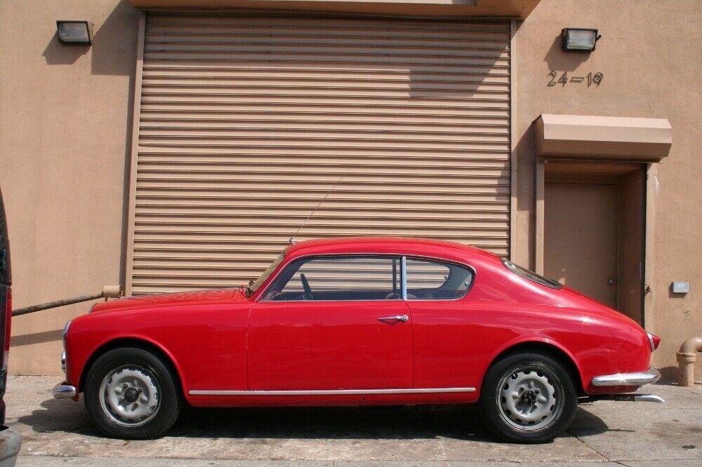 1957 lancia aurelia b20 red with black leather coupe