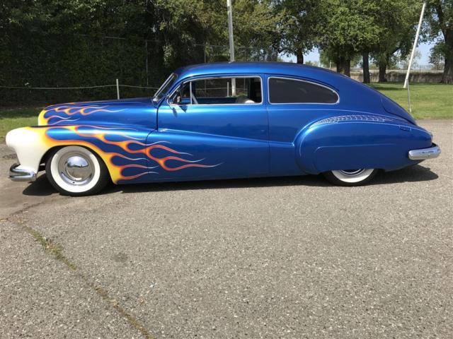 1946 buick sedanette 14,706 miles blue with flames, reduced $3,000