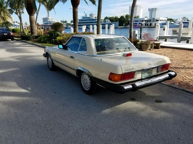 1986 560 sl magnolia tan 2 owner 2 tops factory jump seat 50k original miles