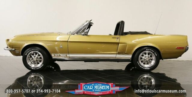 one of only 404 convertibles built! one of only 82 in sunlit gold over black!