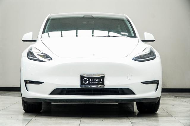 2021 tesla model y standard range rear-wheel drive