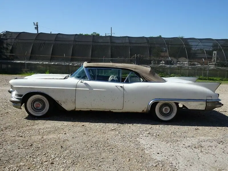 1957 cadillac eldorado biarritz project. factory a/c ,2x4 batwing. stored 1966