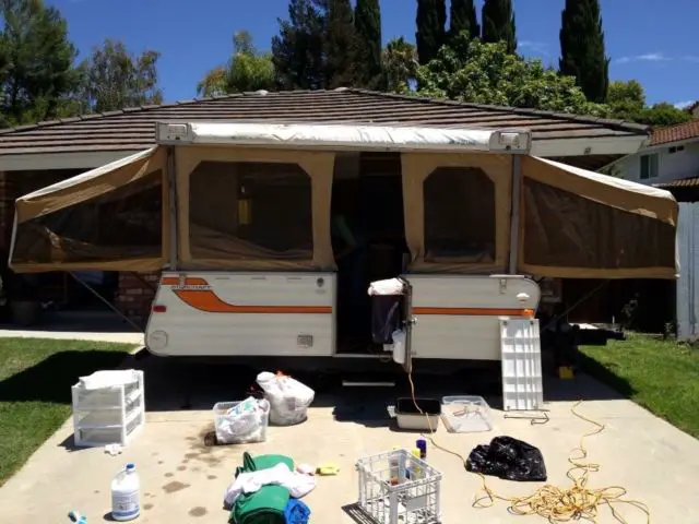 1996 buick roadmaster station wagon with 1976 roadrunner tent trailer