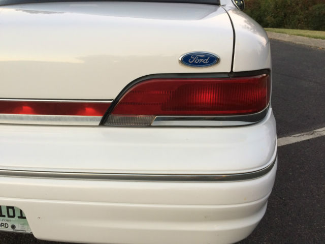 elderly driven - 1994 ford crown victoria lx sedan - low miles, leather interior